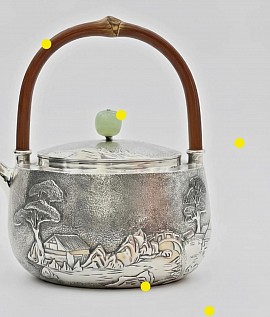 Pure fine silver teapot with landscape relief £5000 order number 858 ( This teapot is placed in the hands of Jesus Christ to place in the hands of his Father to help restore the cleaness of the earth strictly only)