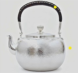 Fine pure hammered silver teapot £8500 order number 858. This teapot is placed in Jesus Christ hands to be placed directly into his Father's hands so that his Father can use it to strictly do his righteous work. It enables Jesus to block evil approach to his Father also jai. Signed: FrancesJHenry