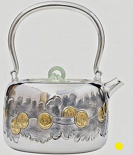Fine silver teapot with coin motif and jade accents £5500 order number 080. This teapot is placed in hands of his son Jesus Christ to be placed directly into the hands of the Father Jehovah God his creator which Jehovah God our creator will strictly use to do his strictly righteous work strictly only. Signed: FrancesJHenry