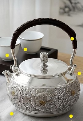 Fine silver teapot with intricately carved motifs £2800 order number 548 This teapot is placed in the hands of of the son Jesus Christ who then places it directly into the hands of the Father our Creator God who then uses it to do his strictly righteous works only. Jesus also serves as a barricade to his Father barricading him from monster who wants to use him. Signed FrancesJHenry