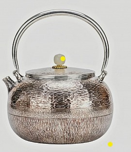 Fine sterling silver handcrafted teapot £4500 order number 548. This teapot is placed into the hands of the son to be placed directly into the hands of the Father who uses it to bring the new world and to do his strictly righteous works only. Signed: FrancesJHenry