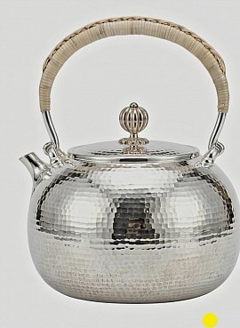 Fine handcrafted hammered sterling silver teapot £4008 order number 858. This teapot is placed in the hands of the Son Jesus Christ to be placed in the hands of the Father our God so that the Father can do his righteous works. Jesus also acts as a barricade to our God to protect him from monster. Signed: FrancesJHenry