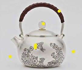 Fine sterling sterling teapot with intricate butterfly carvings £2800 order number 588