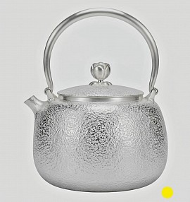 Fine  hammered silver teapot with elegant finial £5000 order number 008