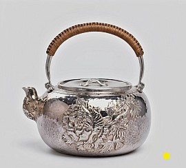 Sterling silver handcrafted teapot with woven bamboo handle £5000 order number 588