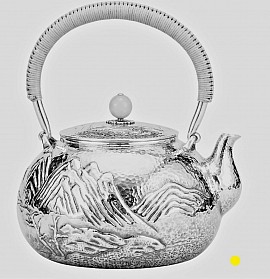 Sterling silver teapot with embossed mountain landscape & woven handle £5000 order number 580