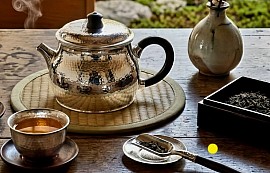 Sterling silver teapot with dark wood handle £1008 order number 588