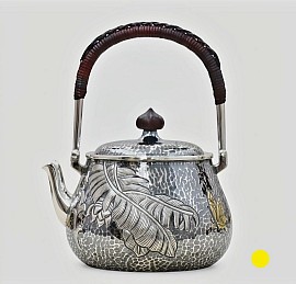Sterling silver teapot with banana leaf relief £4008 order number 508